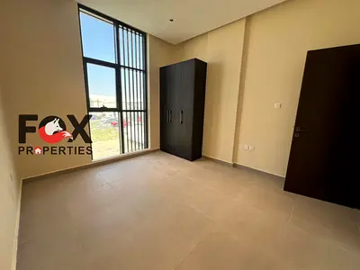 Two rooms and a hall for annual rent in Ajman, in Al Jurf 3 area, new building, first tenant, one month free, wall closets, balcony, panoramic views