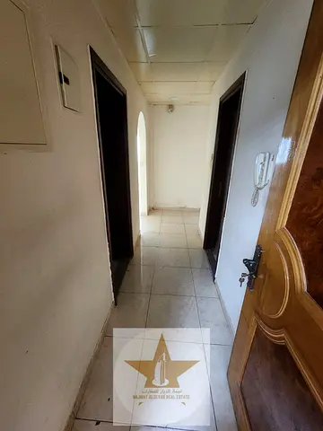 Spacious 2BHK with Balcony & FREE Covered Parking in Al Qasimia (Al Mahattah), Sharjah! 🌟 An ideal family living space combining a prime central loca