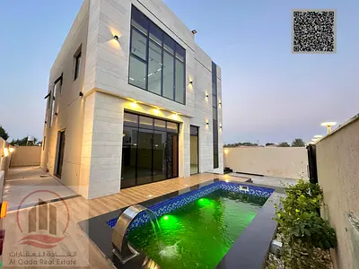 Villa for sale in Ajman, Al Zahiyah, 4 master bedrooms, majlis, living room, maid's room, and swimm