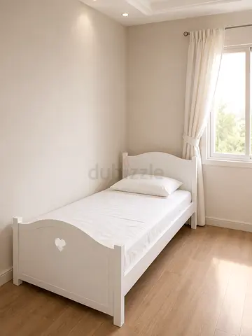 White Single Wooden Bed with Heart Detail