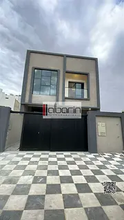 Villa for sale in Ajman: 5-bedroom townhouse (all master bedrooms) with a spacious living area.