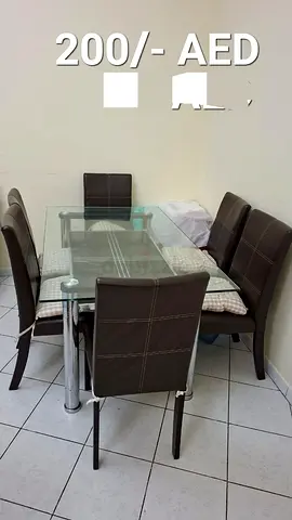 Glass Top Dining Table with 6 Brown Leather Chairs - Good Condition