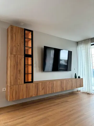 Wall-mounted wooden entertainment unit with display shelves