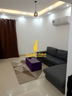 Luxury apartment, second occupancy, one bedroom and living room with a balcony and open view. Ajman 