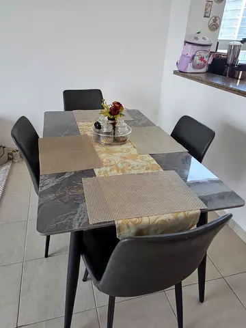 Almost new 4-seater dining table set with marble top