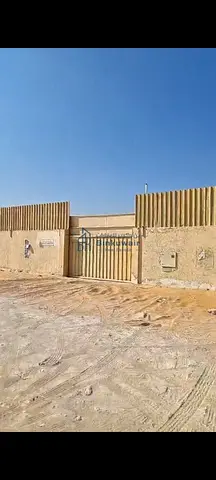 Enclosed yard for sale in Sajaa Industrial Area.