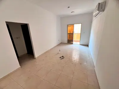 1BR apartment in Al Rawda 3 Al Salam St, spacious with balcony, split AC, prime location near Every Day Mall, easy access to Sharjah & Dubai.
