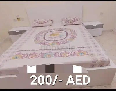 White wooden double bed with matching bedside tables - good condition