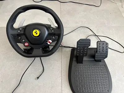 Thrustmaster T80 Ferrari 488 GTB Edition wheel set with Pedals for (PS5,PS4, PC) Slightly used