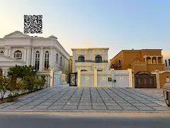 Large villa in Al Muwaihat area, directly from the owner, freehold, close to all services, with elec