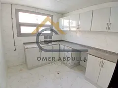 Elegant 1BHK with bright living space in Muwaileh