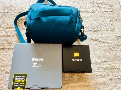 Nikon Z fc Mirrorless Camera – 16-50 mm lens, battery, memory card and camera bag