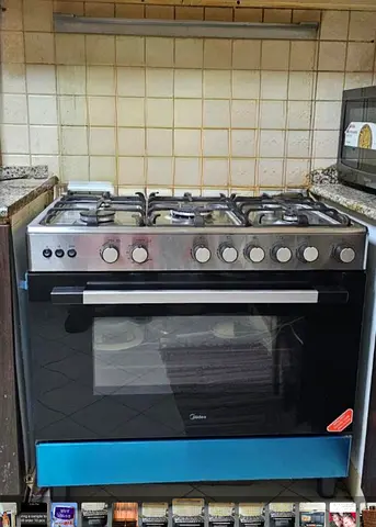 Used freestanding 5-burner gas range with oven - good working condition