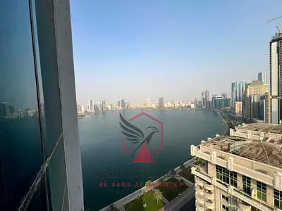 argest 2 Bedroom Apartment with Sea View Balcony Free AC by Owner Free Parking Built in Wardrobes Prime Location First Row on Khalid Lagoon