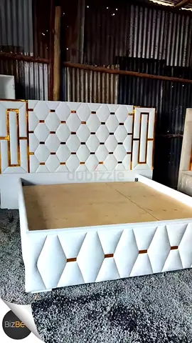White Upholstered Queen Bed with Geometric Gold Accents