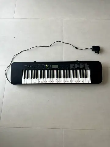 Casio 61-Key Electronic Keyboard with Power Adapter - Good Condition