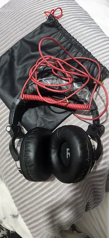 Used over-ear wired headphones with cable For sale only 200 AED STEELL NEW
