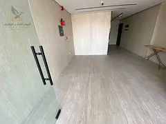 For annual rent in Ajman a brand new two bedroom apartment with a living room, first occupancy in Al
