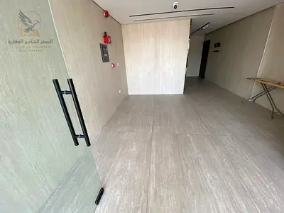 For annual rent in Ajman a brand new two bedroom apartment with a living room, first occupancy in Al Jurf area Features include two bathrooms