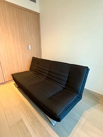 Black convertible sofa bed in good condition