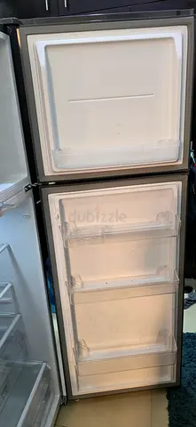 Used upright freezer/refrigerator in good working condition