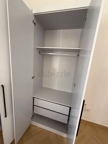 White Wardrobes.. one corner wardrobe with 2 doors and 1 straight wardrobe with 2 doors and drawers