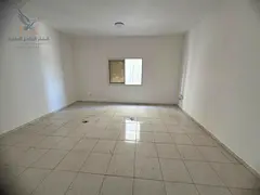 For annual rent in Al Rashidiya 3 Ajman a studio apartment with a separate kitchen The building is c