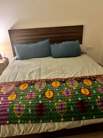 Wooden Bed and mattress with Modern Slatted Detail