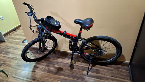 Excellent condition foldable bicycle with lights, mirrors and phone pouch for sale