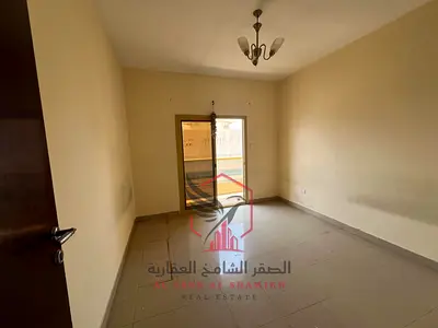Sea view, free parking, beautiful two bedrooms and a living room with a large balcony, spacious area for rent in Al Qasimia