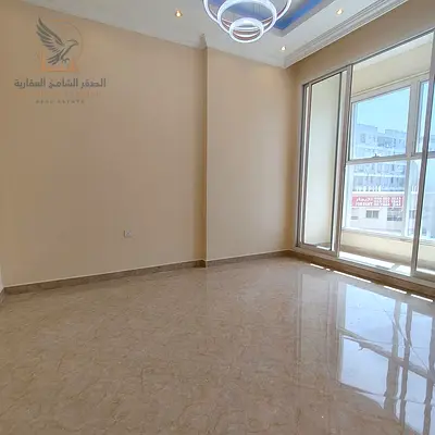 Spacious 2 bedroom apartment for annual rent in Ajman with 2 bathrooms, balcony, private parking,family-friendly building,and flexible payment options