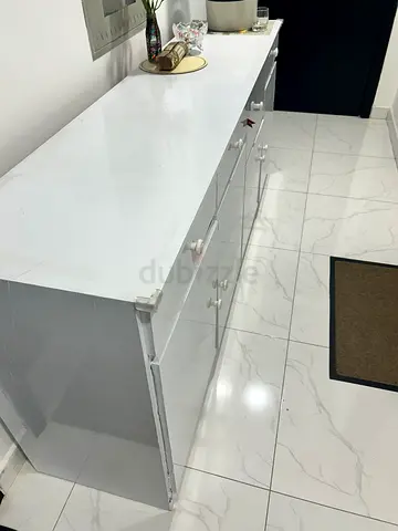 Long white low storage cabinet / TV console