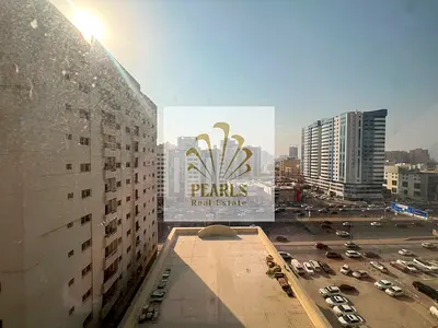 Annual Rent Ajman - 2BR & Hall in Al Nuaimiya near Gift Way | 2 Bathrooms | Balcony | Central AC | Built-in Wardrobes | Free Parking | 42K AED