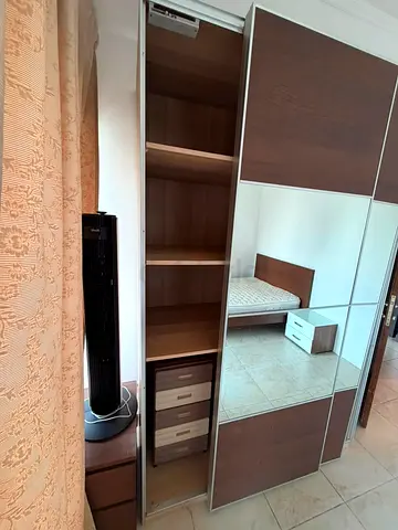 Used sliding-door wardrobe with mirror panels — good condition
