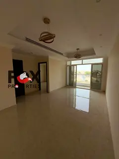 2BR Hall for Annual Rent in Al Rawda, Ajman, opposite Kanz Mall. Spacious layout, free parking, and