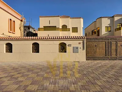 Luxury villa for sale in Ajman, Al Rawda 2 | 5 master bedrooms | Includes electricity, water and air conditioning.