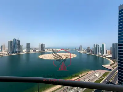Sea view, free parking, gym and swimming pool, free air conditioning, two large bedrooms and a living room with two large balconies + maid's room for