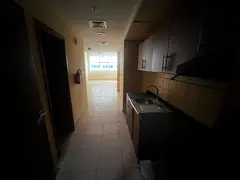 Studio in Ajman One Towers Al Rashidiya 3, separate kitchen, wardrobes, central AC, spacious.