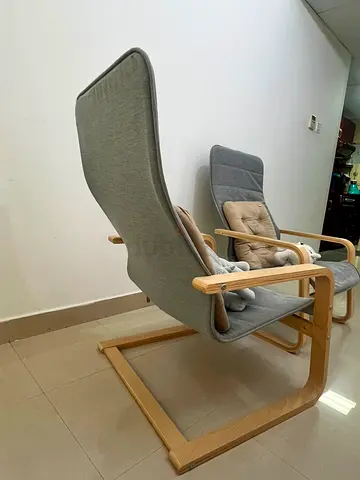 Ikea Pair of light-wood frame lounge chairs with grey fabric