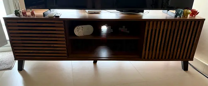 Solid wood TV media console with slatted doors - walnut finish