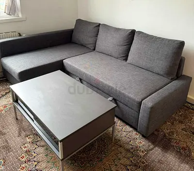Grey L-Shaped Sofa Bed and Matching Coffee Table
