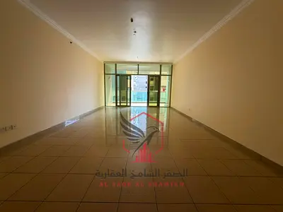 Two master bedrooms with free AC, free parking, gym and pool, prime lively location close to all services like cafes and shops, near Dubai exit.