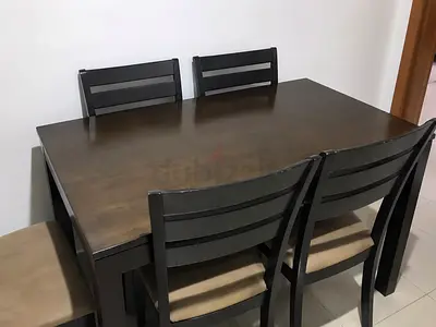 Well condition dining table with chairs available with super flexibility immediately available
