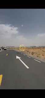 For sale: Commercial and residential land in Rawdat Al-Qurt area, Al-Ruwaida suburb. Area: 7,370 sq