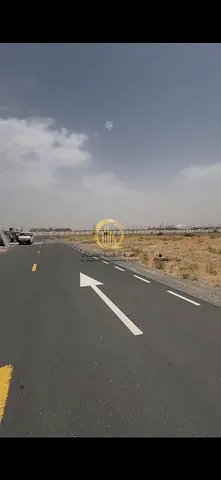 For sale: Commercial and residential land in Rawdat Al-Qurt area, Al-Ruwaida suburb. Area: 7,370 sq ft. Prime location, corner on a street and alley.