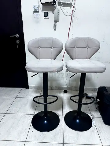 Set of 2 Adjustable Bar Stools with White Padded Seats and Black Base