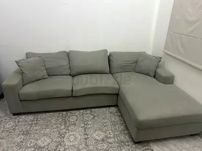 Light grey L-shaped sofa with chaise, good condition