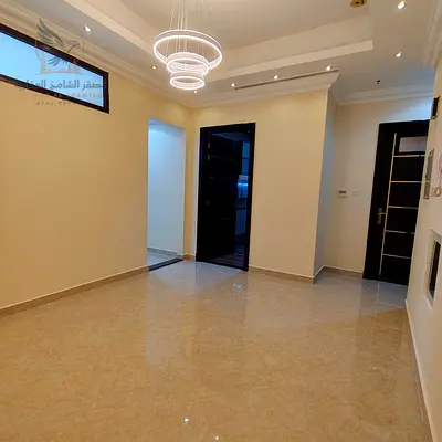 Four-bedroom apartment with a living room for annual rent in Al Rawda 3, Ajman, with private parking. A great opportunity to rent a spacious apartment