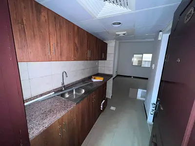 Spacious studio apartment with a semi-detached kitchen and built-in wardrobes, priced at AED 18,000 per year. Located in the vibrant Al Nuaimiya 1 are