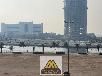 A spacious one-bedroom apartment with a balcony and sea view in the Liwara 1 area, Ajman Corniche, close to all services and main roads.